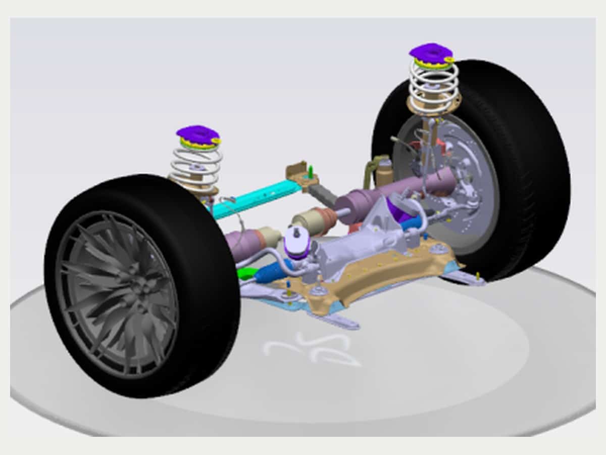 CAD visualization of a vehicle suspension assembly, showing wheel, spring and linkage packaging.